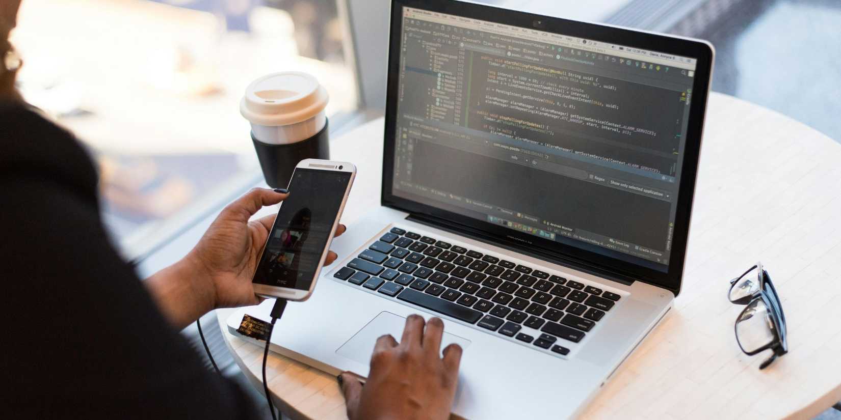 Image of a man using a laptop.