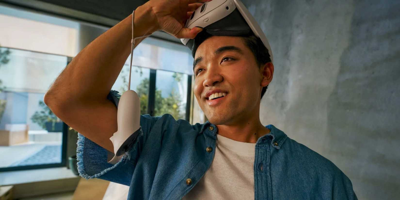 Image of a man taking off his meta glasses.