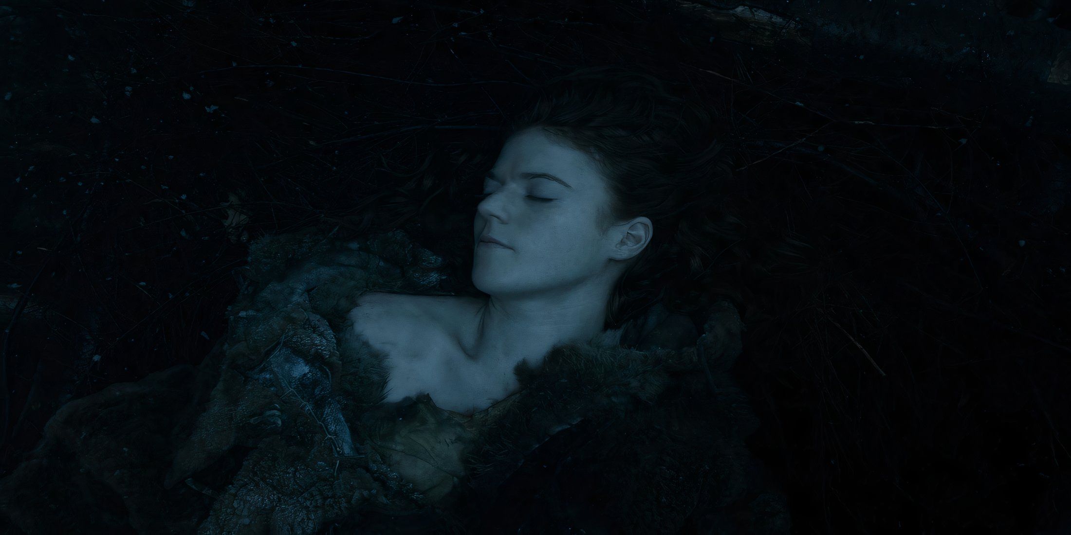 A dead Ygritte being prepared to have her body burned by Jon Snow in Game of Thrones