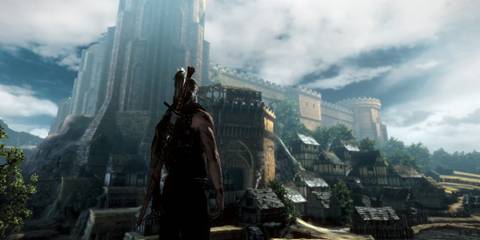 A Key Frame From The Witcher 2 Showing The Player Viewing A Towering Urban Environment From The Outskirts