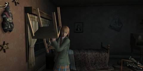 Alyssa holding a chair in Clock Tower 3