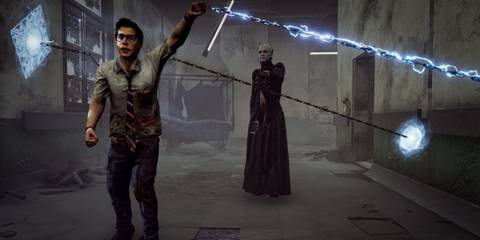 Pinhead grabbing Dwight Fairfield with chain hooks