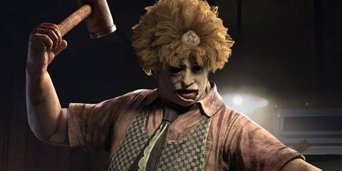 Leatherface in his housewife skin wielding a hammer