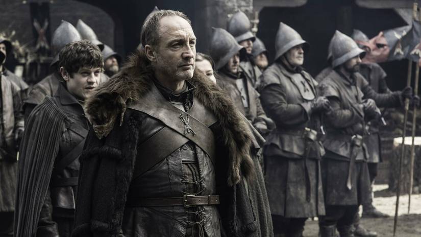Roose Bolton standing in front of Ramsay in Game of Thrones