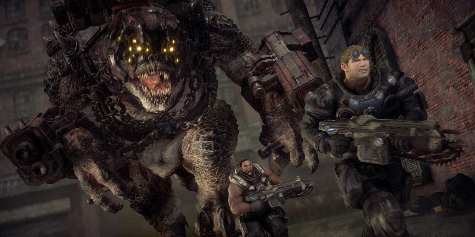 Baird and Cole running from a huge monster in Gears of War