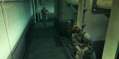 Hiding behind a corner as Snake in Metal Gear Solid 2 Sons of Liberty