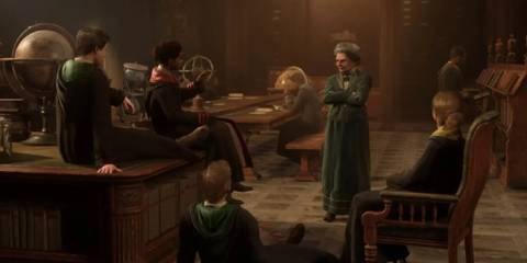 Hogwarts students in a library with a professor giving a lesson in hogwarts legacy