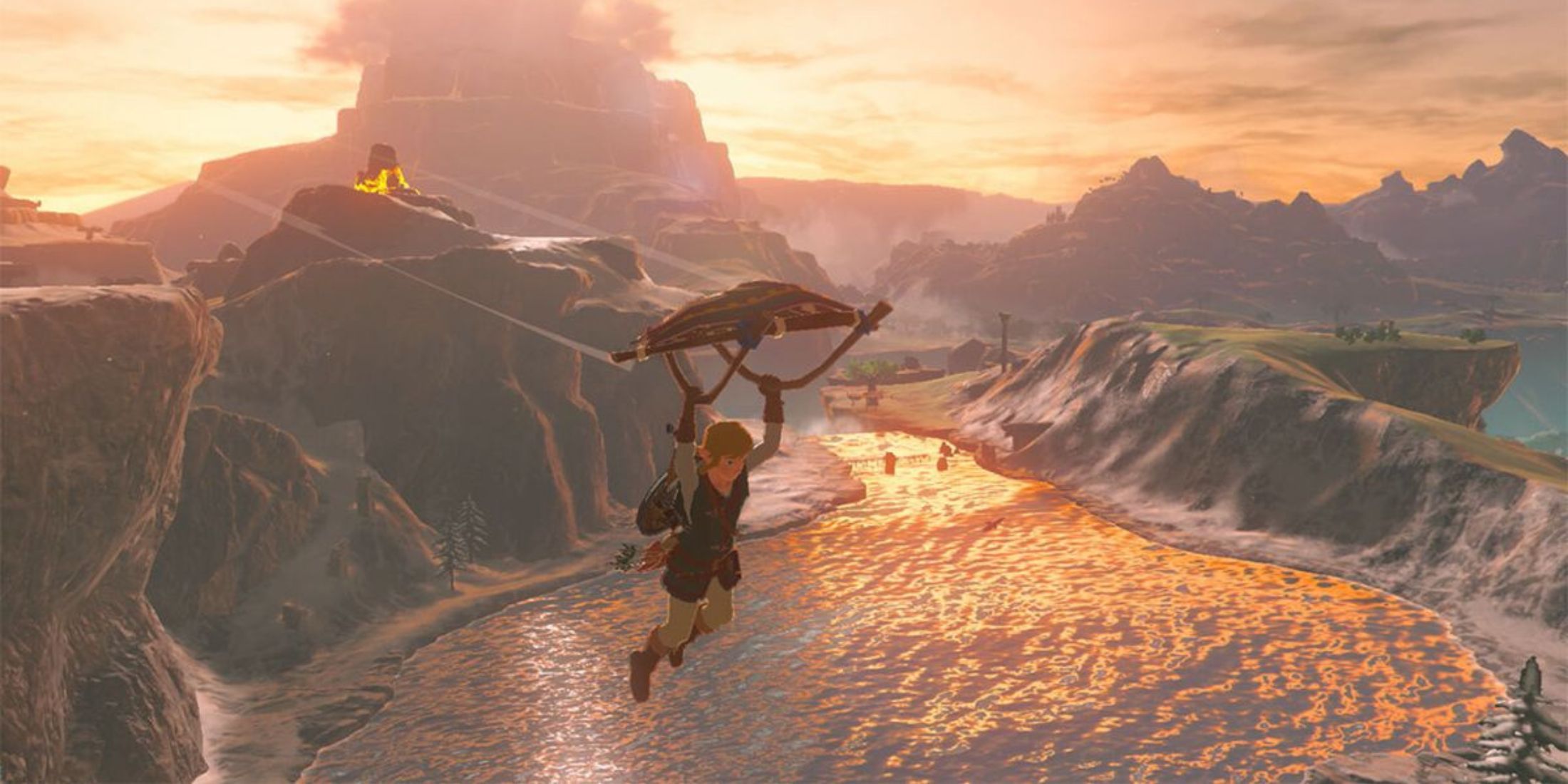 Link gliding over of a lake - The Legend of Zelda Breath of the Wild