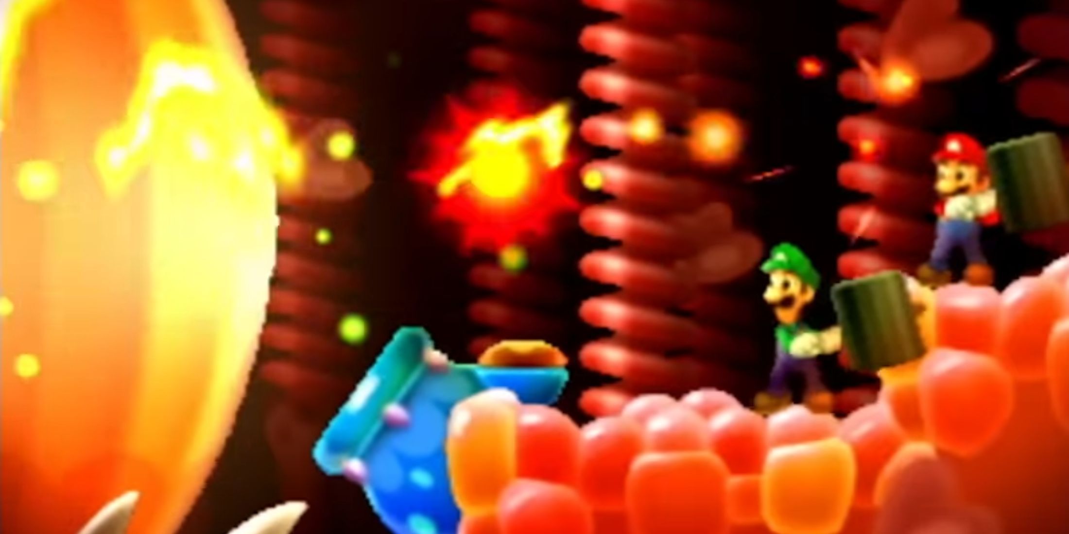 Mario and Luigi using their hammers to fight a growth inside Bowser's body - Mario & Luigi Bowser's Inside Story + Bowser Jr.'s Journey