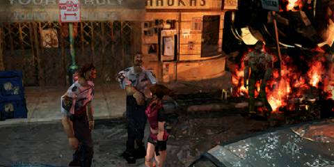 Claire walking past a group of zombies in Resident Evil 2