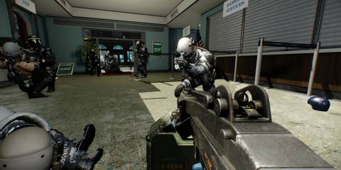 Shooting enemies with a shotgun in Payday 2