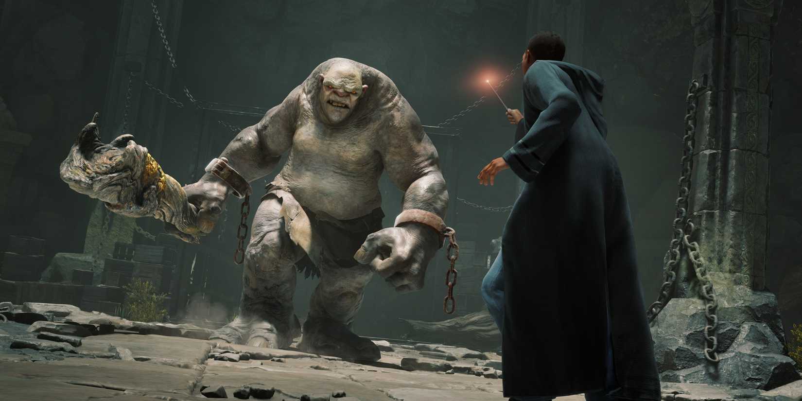 Hogwarts student faces off against a massive, chained troll in Hogwarts Legacy