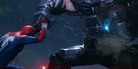 spider-man stopping a punch from rhino in marvel's spider-man