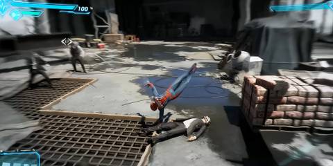 spider-man shooting a web at an enemy