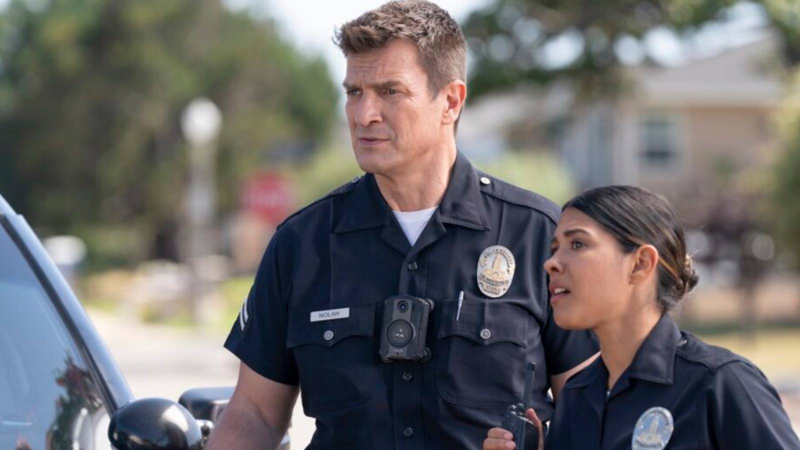 John Nolan (Nathan Fillion) and Celina Juarez (Lisseth Chavez) on The Rookie