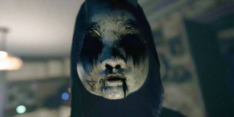 Visage Lucy wearing mask