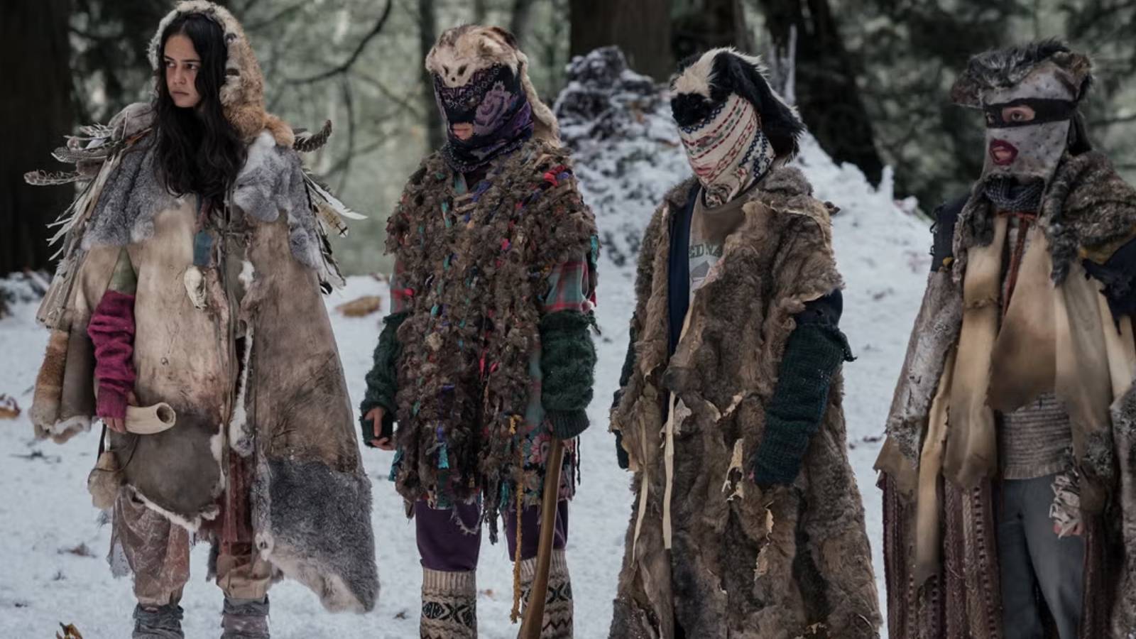 The cast of Yellowjackets in the woods