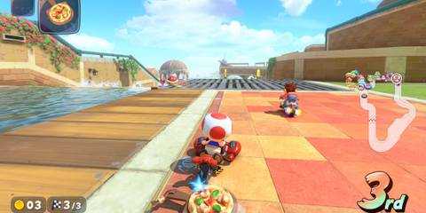 Banana Cup Mario Kart World Toad with a pizza