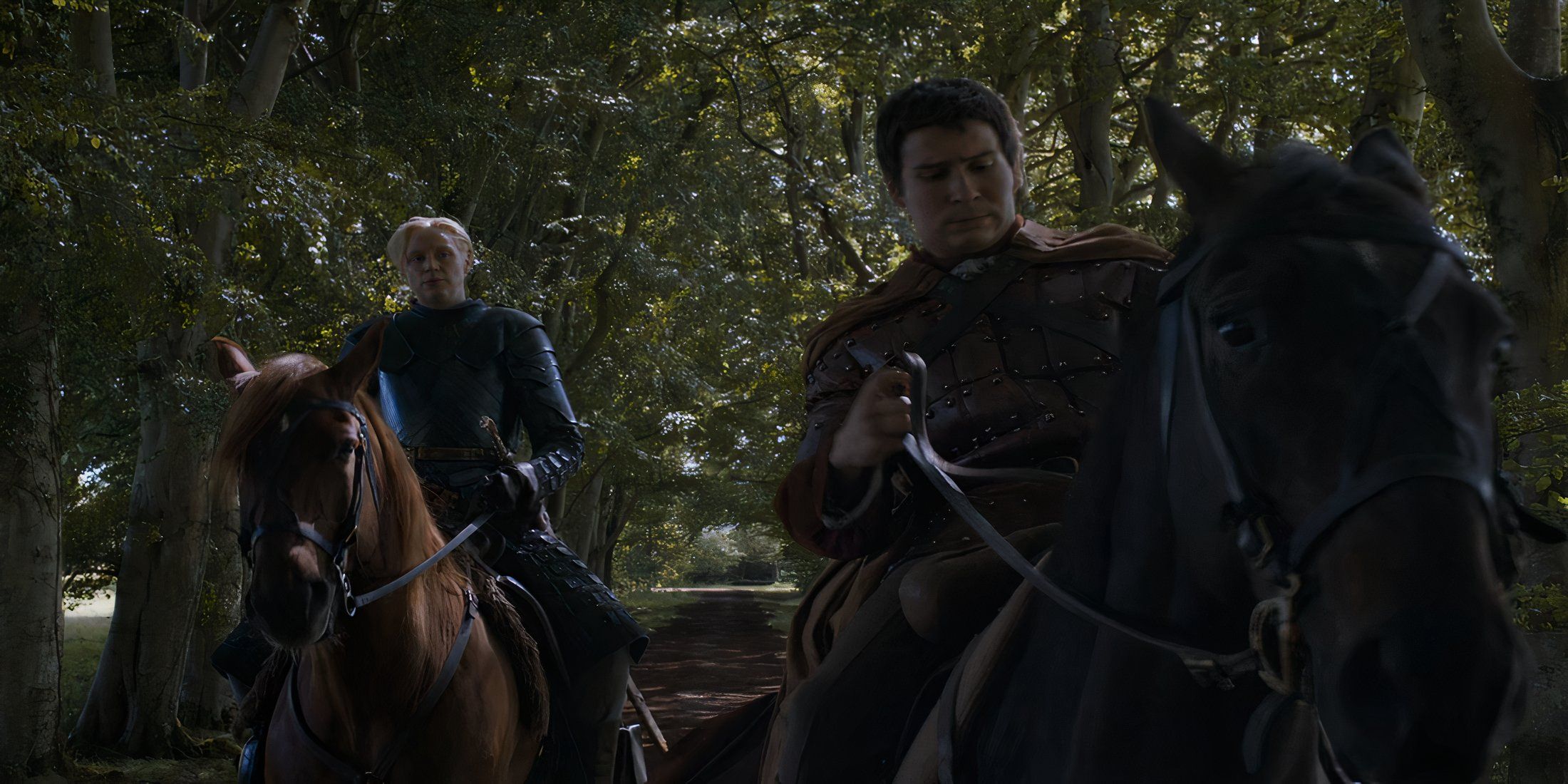 Brienne of Tarth and Podrick Payne riding horses alongside one another in Game of Thrones