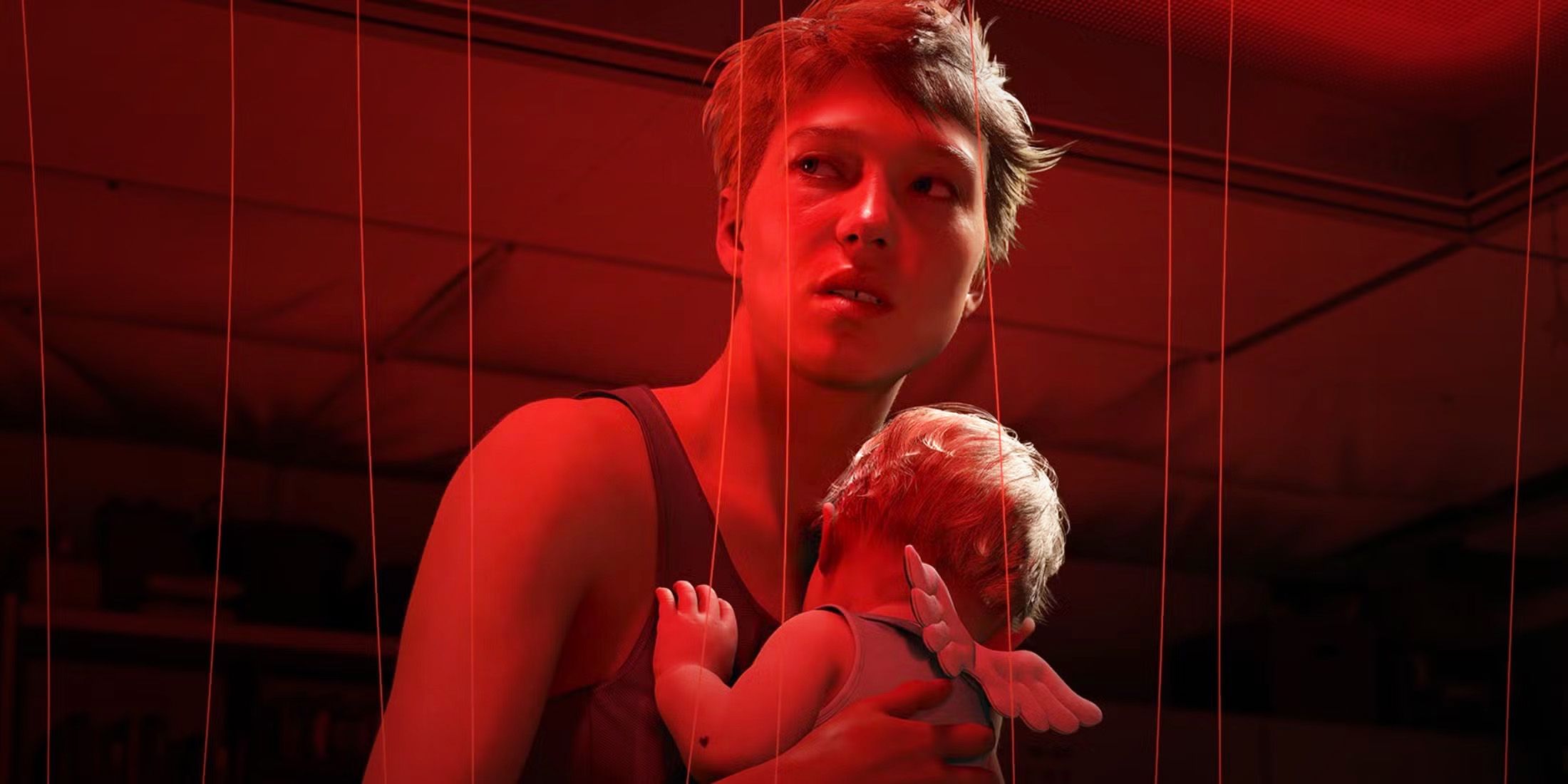 Death Stranding 2 Fragile holding baby with angel wings in red-lit environment