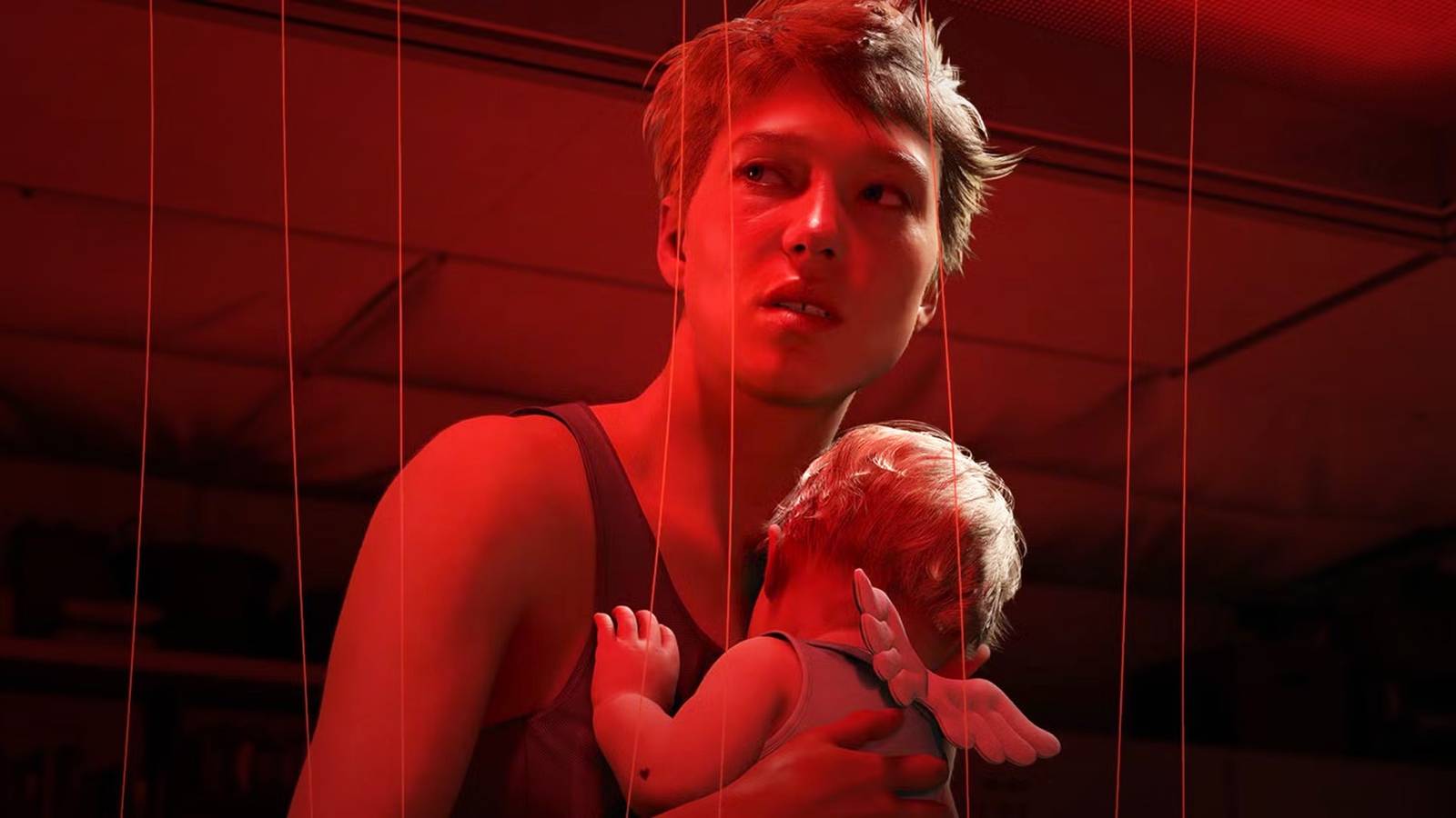 Death Stranding 2 Fragile holding baby with angel wings in red-lit environment