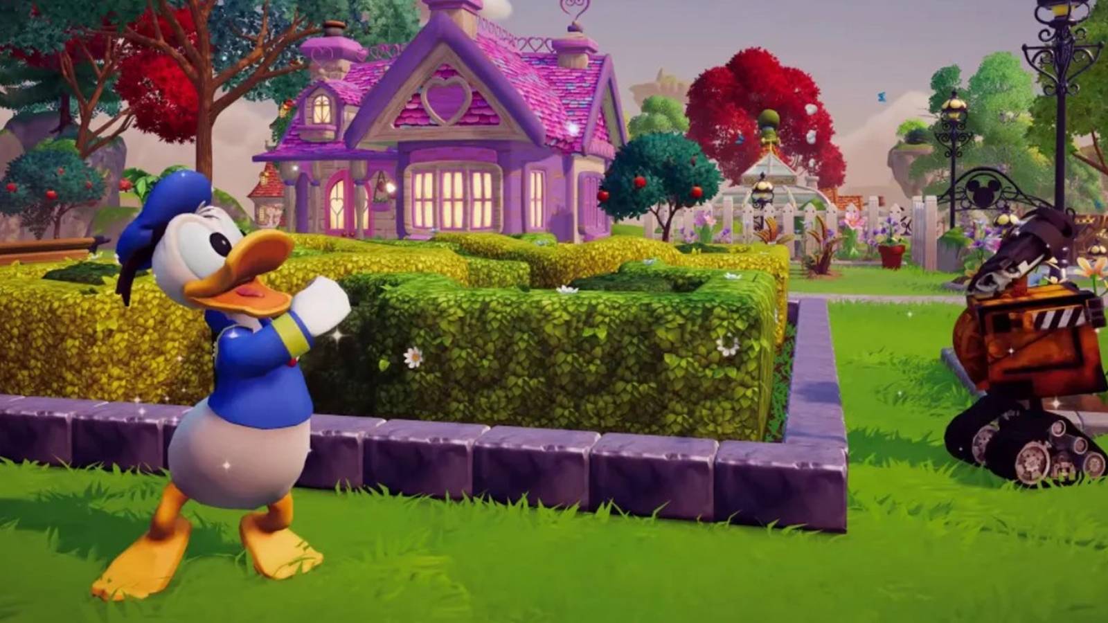 Donald Duck and WALL-E in a vibrant garden maze near a pink cottage in Disney Dreamlight Valley