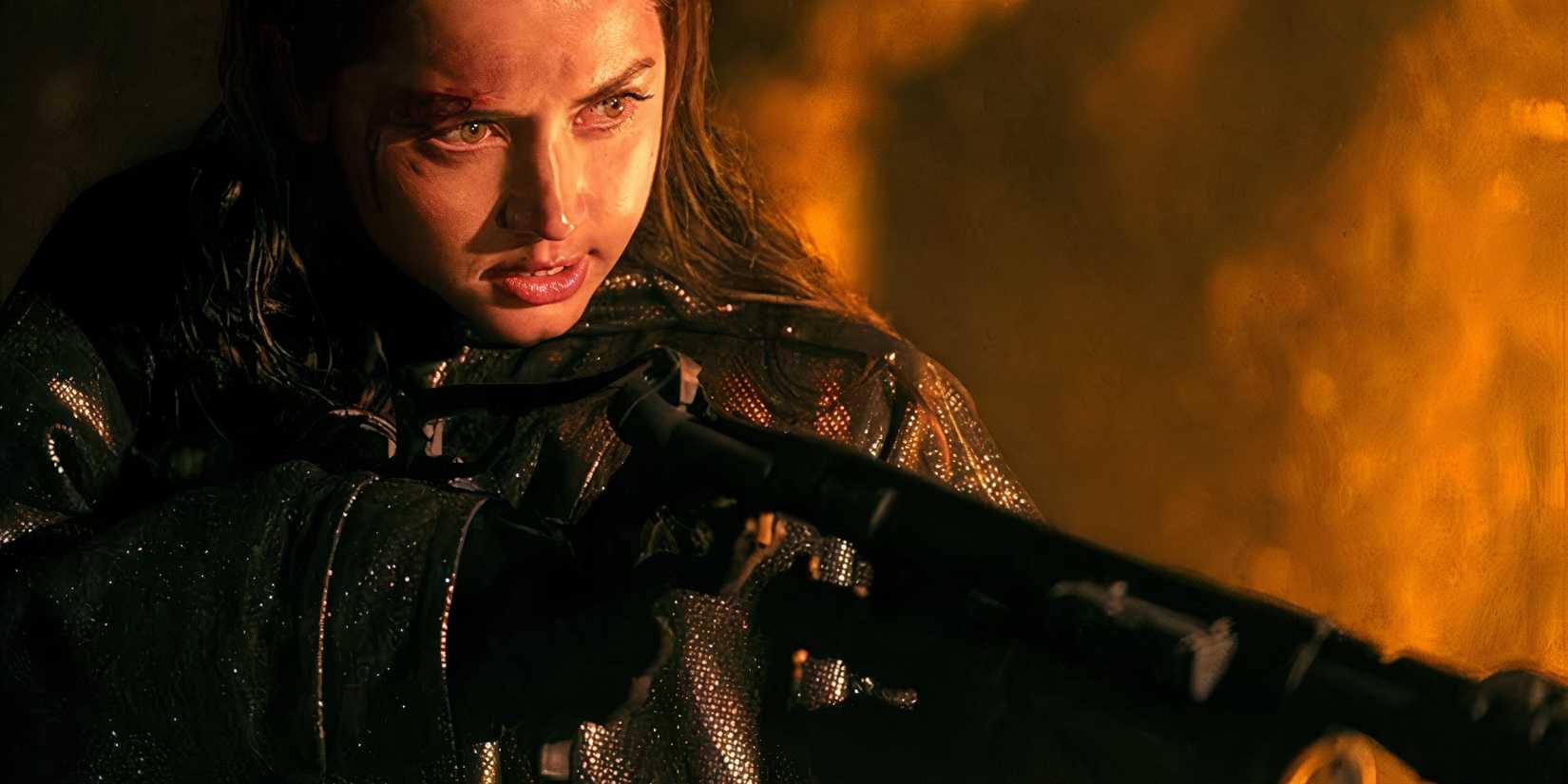 Eve holding a flamethrower in Ballerina