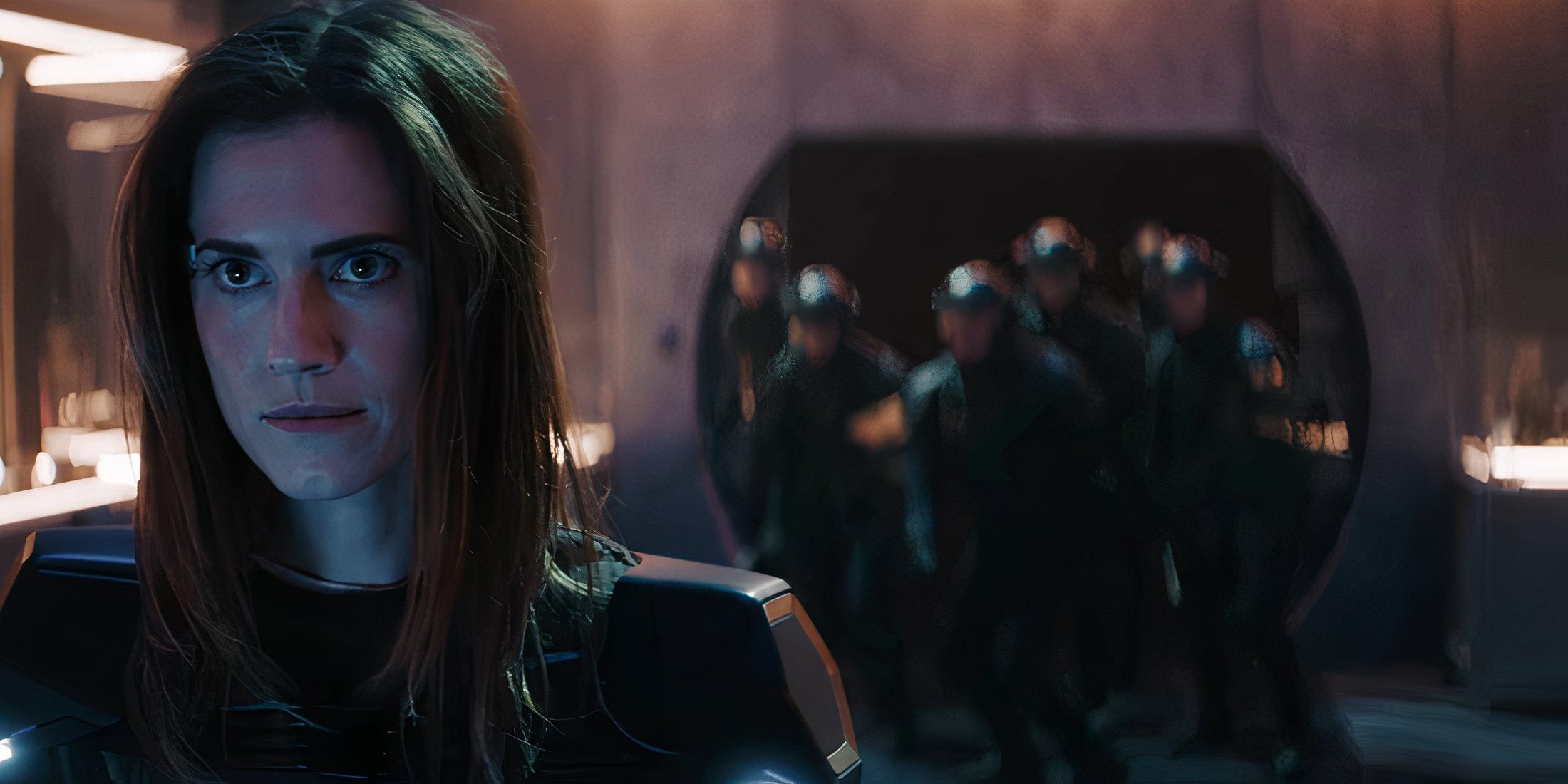 Gemma facing guards in Megan 2