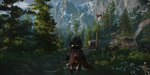 Geralt rides Roach through a lush forest with snowy mountains in the distance in The Witcher 3 on Nintendo Switch