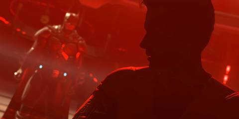 Batman speaking to Superman inside the Red Sun Prison in Injustice 2