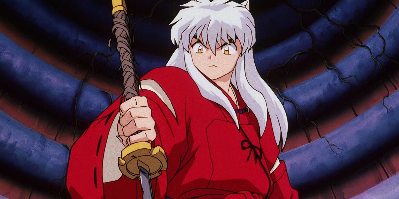 Inuyasha holds Tessaiga.