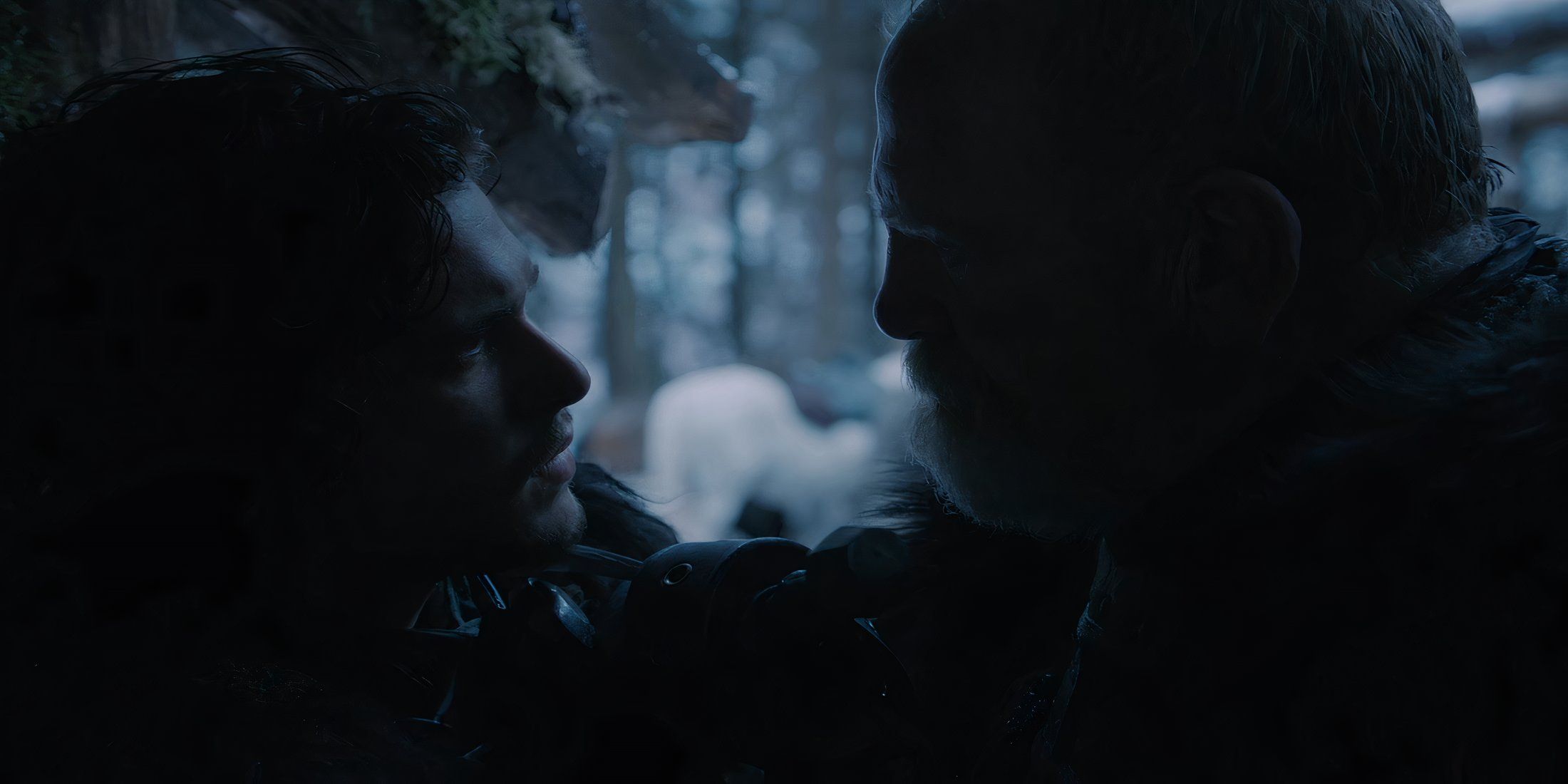 Jeor Mormont pinning Jon Snow against the wall in Game of Thrones