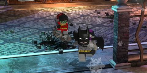 Batman and Robin running through the zoo in LEGO Batman: The Videogame