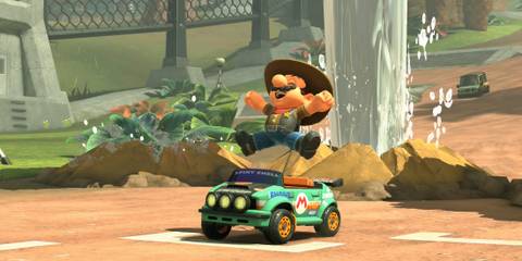 Mario driving as a Cowboy in Mario Kart World