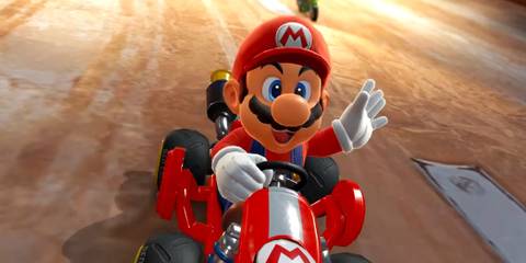 A screenshot of Mario riding in his red kart in Mario Kart World.