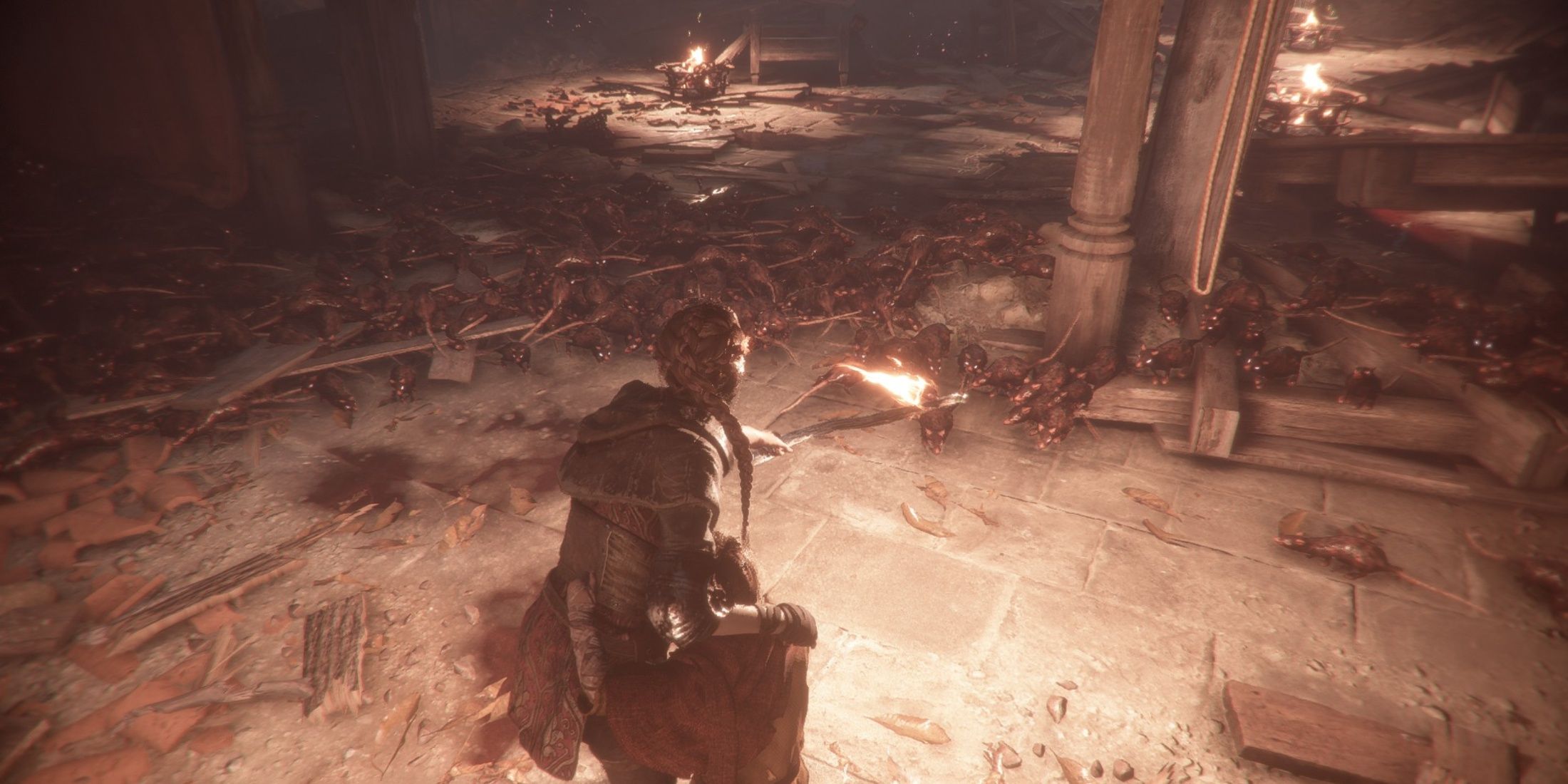 A Plague Tale Innocence Amicia and Hugo Use Light to Drive Rats Away