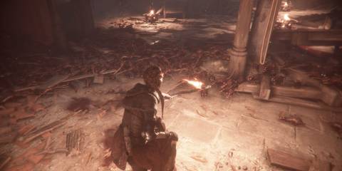 A Plague Tale Innocence Amicia and Hugo Use Light to Drive Rats Away