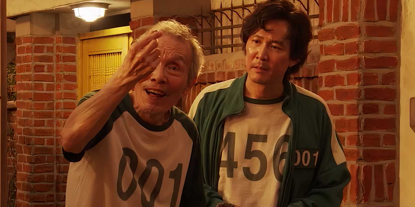 Gi-hun and Oh Il-nam playing marbles in Squid Game season 1