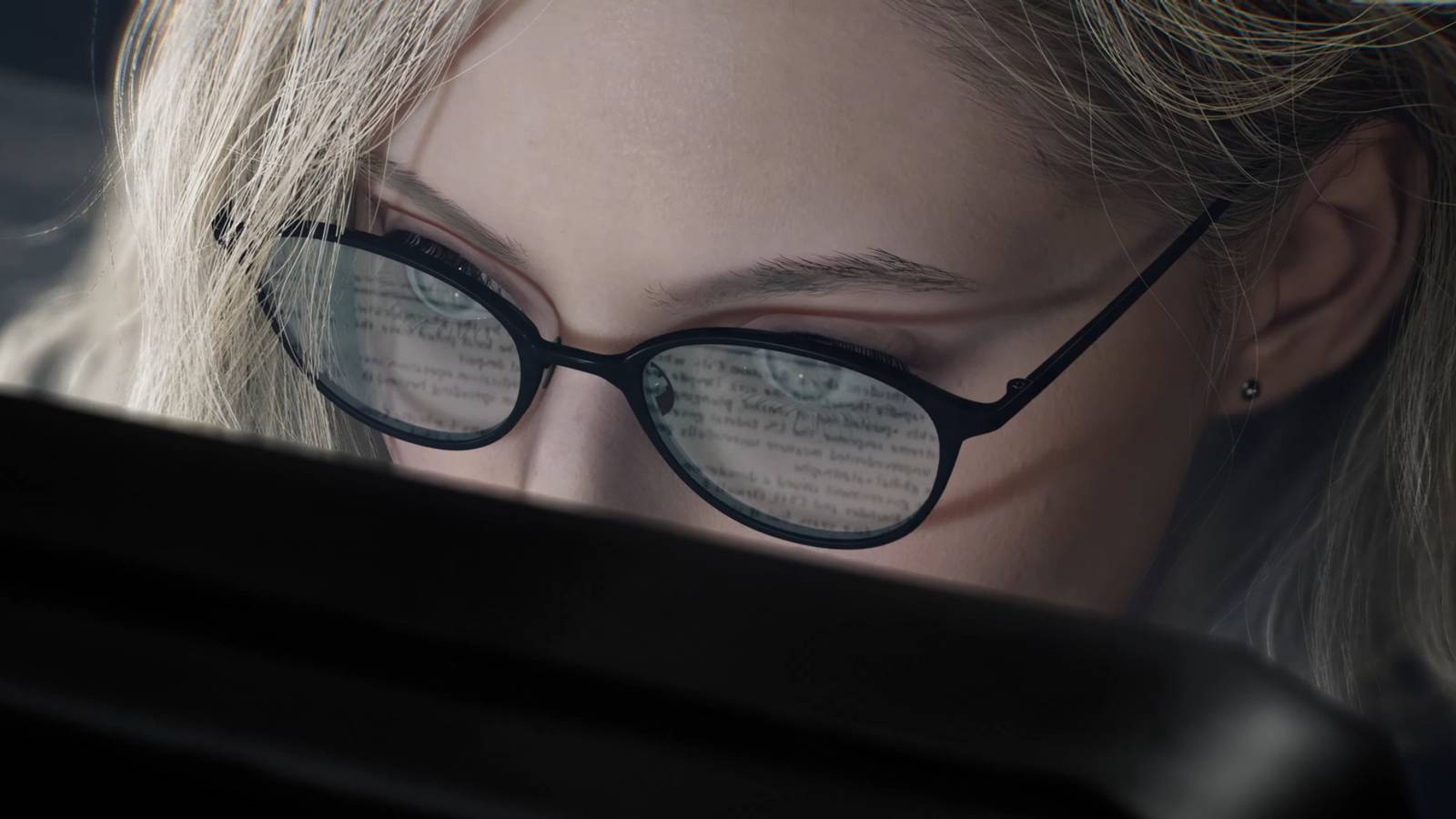 Resident Evil Requiem Grace Looking at Her Computer