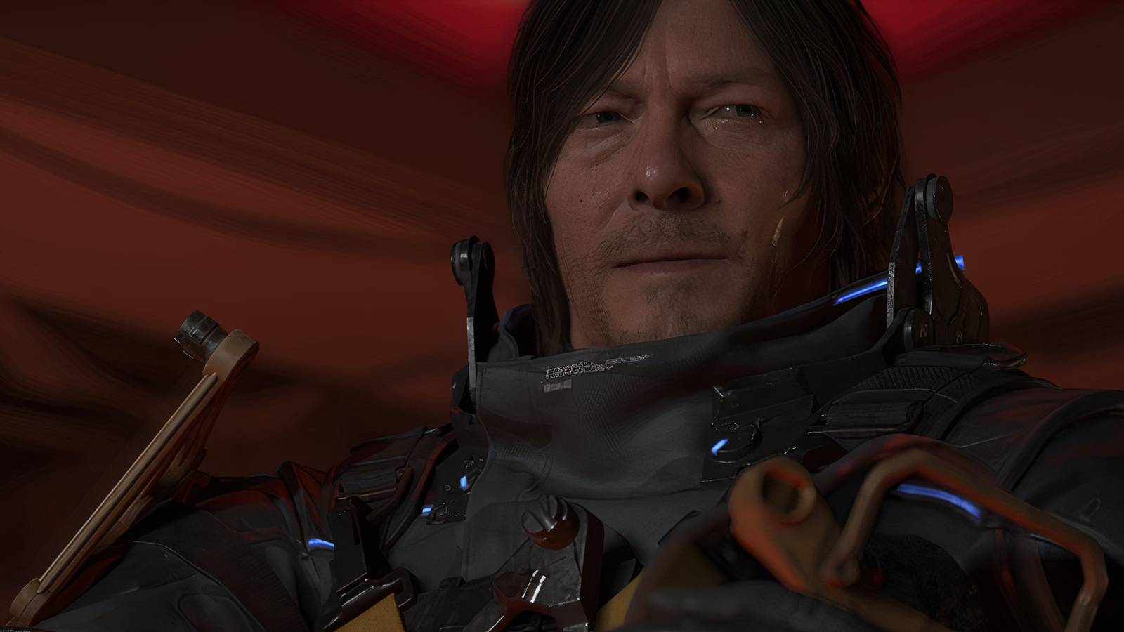 Sam in the red light in Death Stranding 2 On the Beach