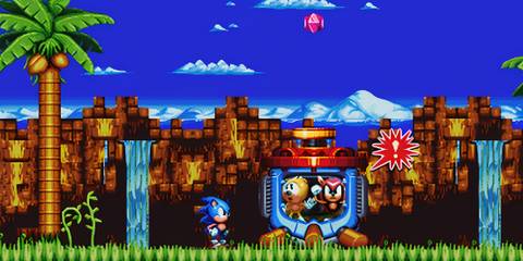 Sonic standing next to a capsule