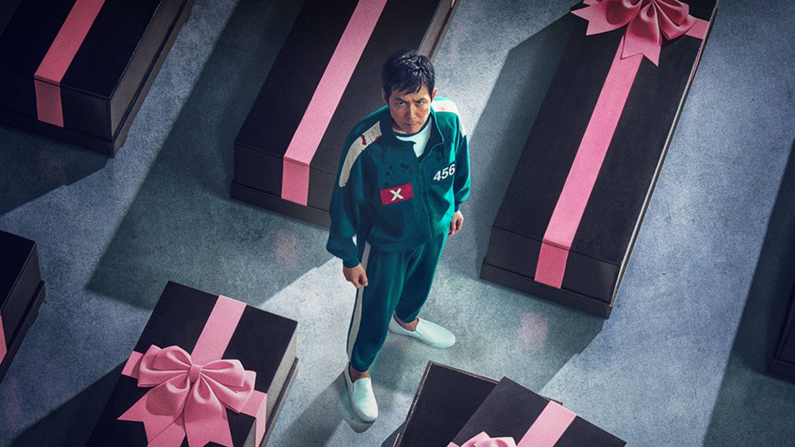 Official promotional image of Squid Game Season 3, with Seong Gi-Hun sorrounded by pink caskets.