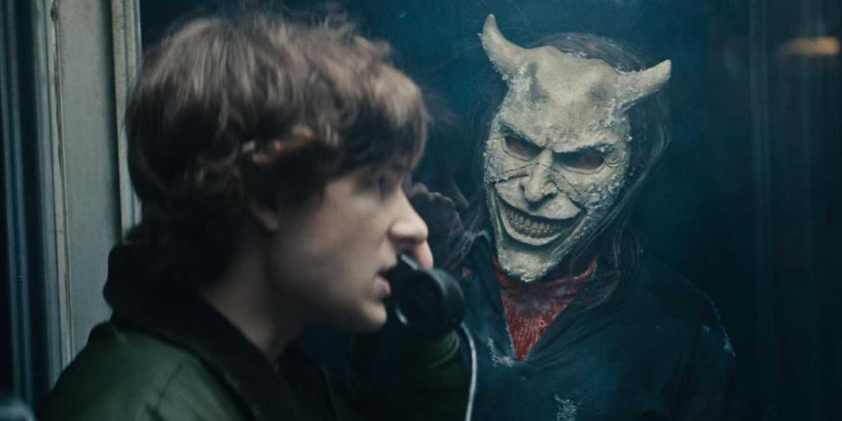 Finn (Mason Thames) and The Grabber (Ethan Hawke) in The Black Phone 2