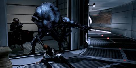 The Collectors kidnapping the Normandy crew in Mass Effect 2