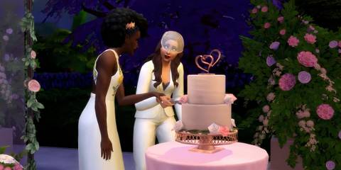 Dominique and Camille cut their wedding cake in The Sims 4