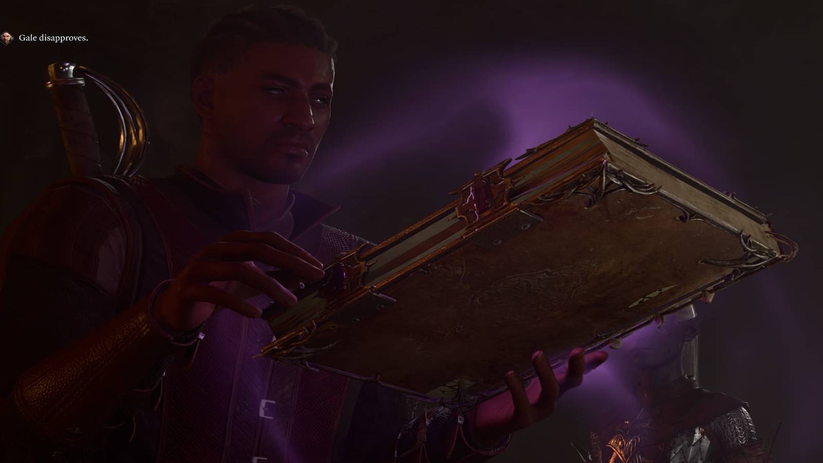 Wyll Holding the Book of Thay 