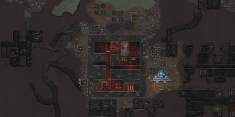 A fortified underground complex thrives amid a wasteland, full of machinery and ruins in RimWorld Odyssey