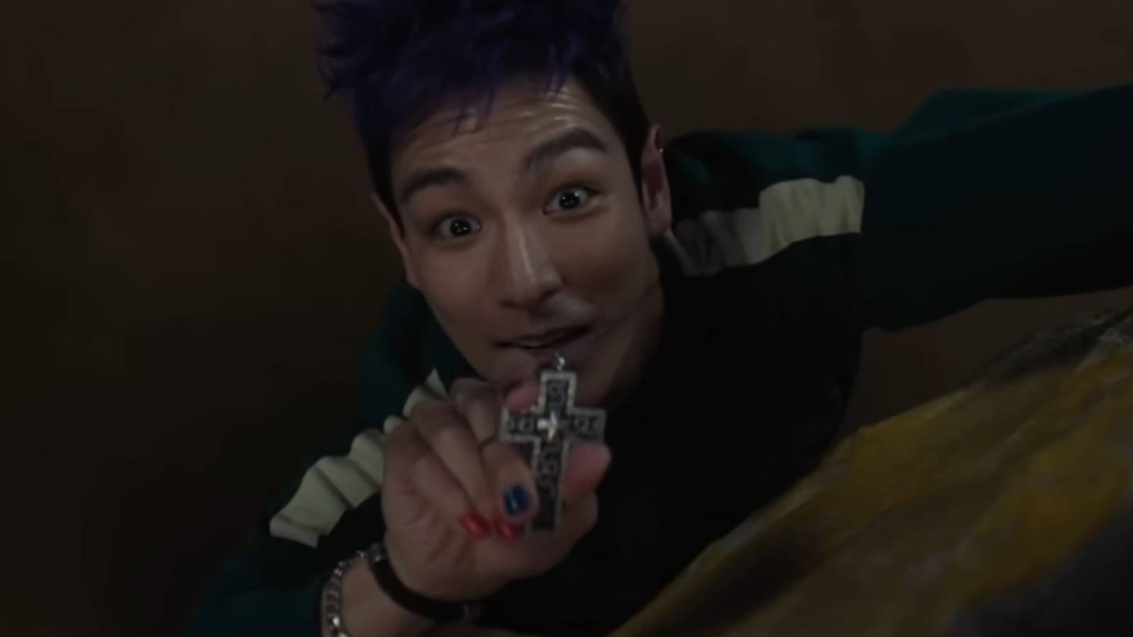 A vision of Thanos offering Min-su drugs - Squid Game