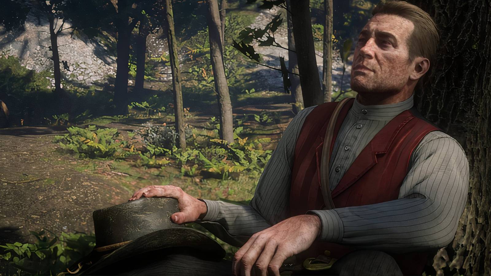 Arthur below a tree in Red Dead Redemption 2