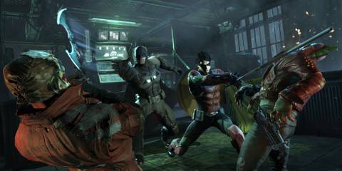 Batman and Robin fighting in multiplayer in Batman Arkham Origins